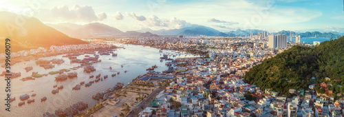 Panoramic view on city of Nha Trang from mountains during sunset. Vietnam