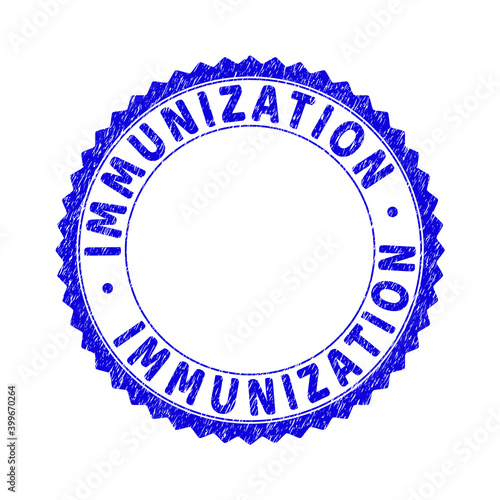 Grunge IMMUNIZATION round rosette stamp seal. Copy space inside circle. Vector blue rubber imprint of IMMUNIZATION label inside round rosette. Stamp seal with dirty texture.
