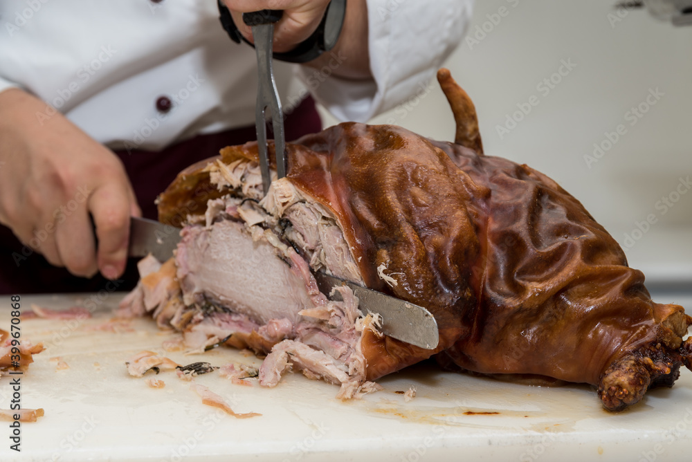 Cook Prepares Grilled Pork Head - Suckling Pig