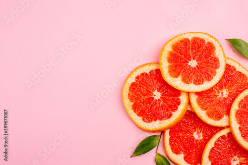 top view tasty grapefruits juicy fruit slices on pink background mellow color diet citrus juice fruit fresh