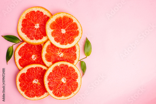 top view tasty grapefruits juicy fruit slices on pink background mellow color diet citrus fresh juice fruit
