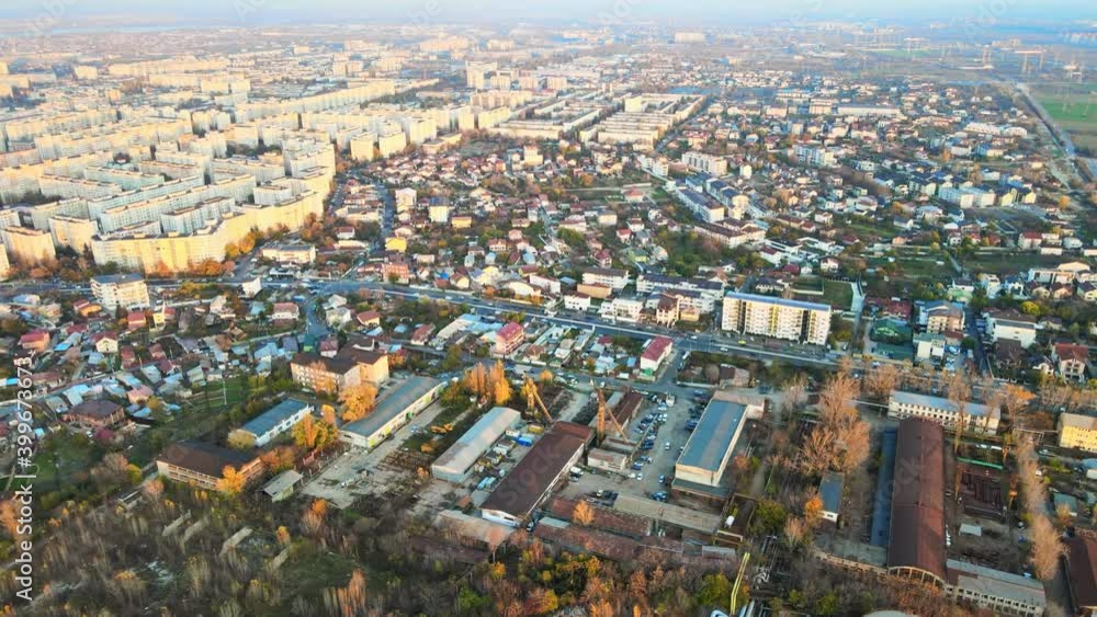 Cityscape of Bucharest, multiple buildings, roads, industrial facility on the foreground, panorama view from the drone, Romania Cityscape of Bucharest, multiple buildings, roads, industrial facility on the foreground, panorama view from the drone, Romania