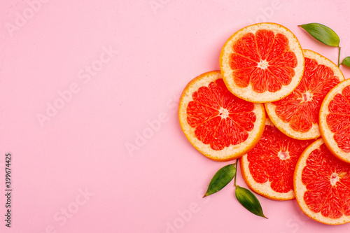 top view tasty grapefruits juicy fruit slices on pink background mellow color diet citrus fresh juice fruit free place