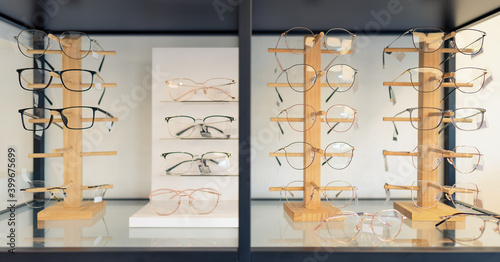 eyeglasses display on glasses stand on shelves in optical store