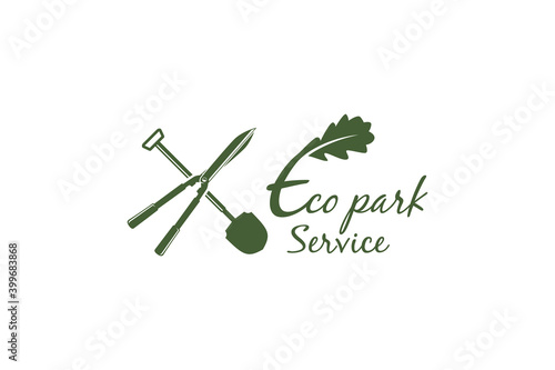 Home lawn and garden care service logo, with shovel and grass shears elements, with green oak leaf elements.
