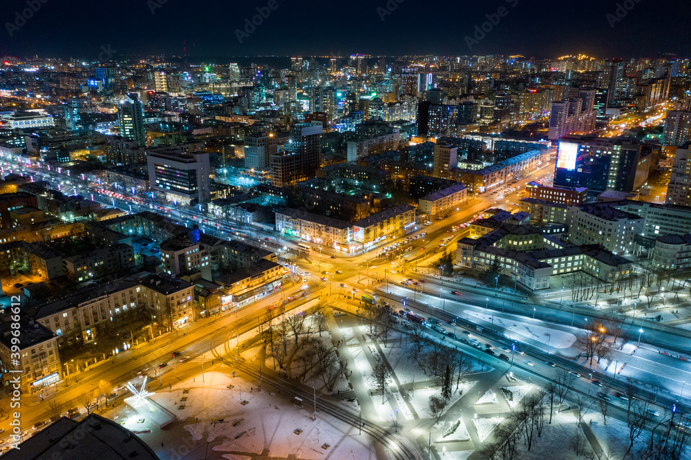 Aerial view of the night modern city. Bright lights of the night streets. Ekaterinburg. Russia Aerial view of the night modern city. Bright lights of the night streets. Ekaterinburg. Russia