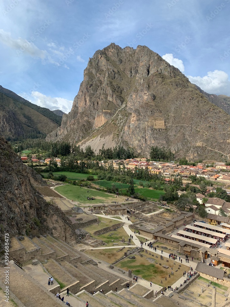 Peru Ollantaytambo Ollanta town of buildings built on foundations of Inca stonework in Sacred Valley Cuzco region Andes mountains.  Pinkulluna Inca storehouses. Ancient Incas fortress ruins. 