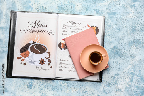Cup of hot coffee and menu ...