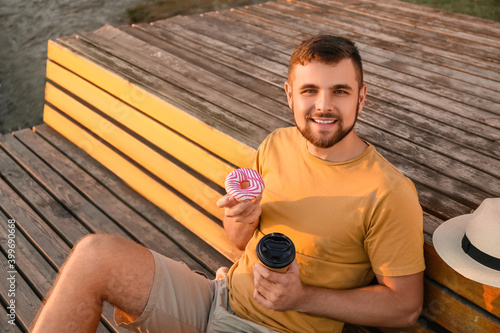 Handsome young man with swe...