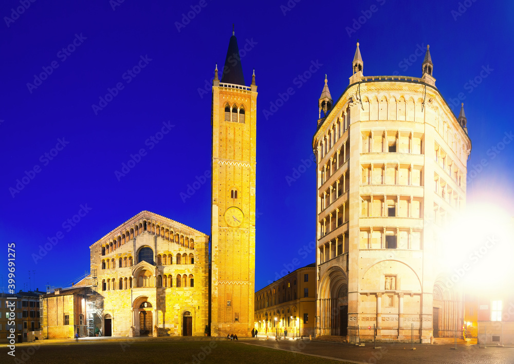 Baptistery and Cathedral is religious landmark of night italian city Parma outdoors.