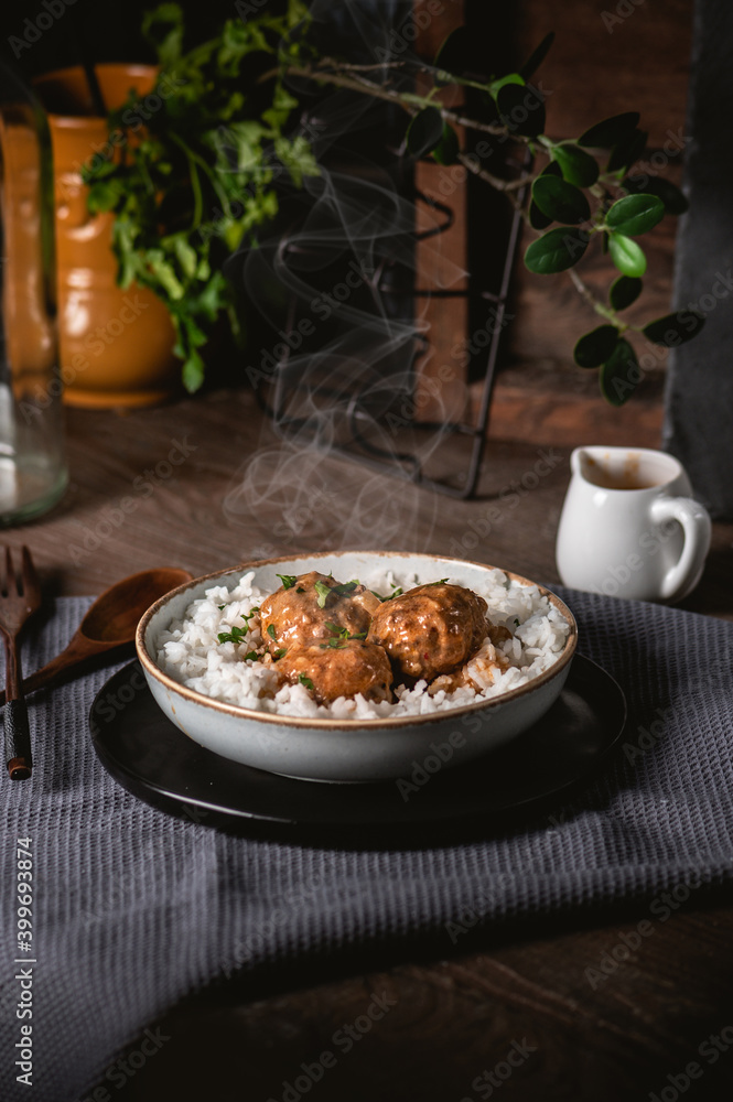 Meatballs with rice on rustic background Meatballs with rice on rustic background