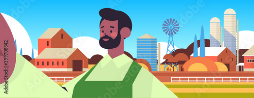 happy african american farmer taking selfie on smartphone camera man making self photo farmland background horizontal portrait vector illustration