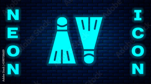 Glowing neon Rubber flippers for swimming icon isolated on brick wall background. Diving equipment. Extreme sport. Sport equipment. Vector Illustration.