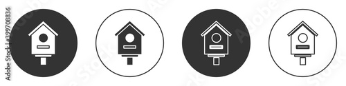 Black Bird house icon isolated on white background. Nesting box birdhouse, homemade building for birds. Circle button. Vector Illustration.