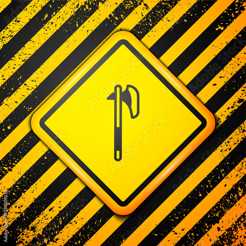 Black Medieval axe icon isolated on yellow background. Battle axe, executioner axe. Medieval weapon. Warning sign. Vector.