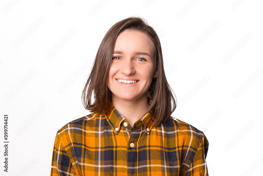 Portrait of a young smiling lady over white background. Portrait of a young smiling lady over white background.