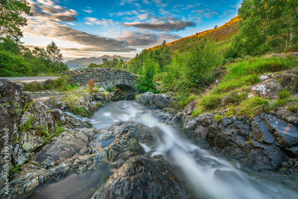 Ashness Bridge long exposure view. Lake District National Park. Cumbria. England Ashness Bridge long exposure view. Lake District National Park. Cumbria. England