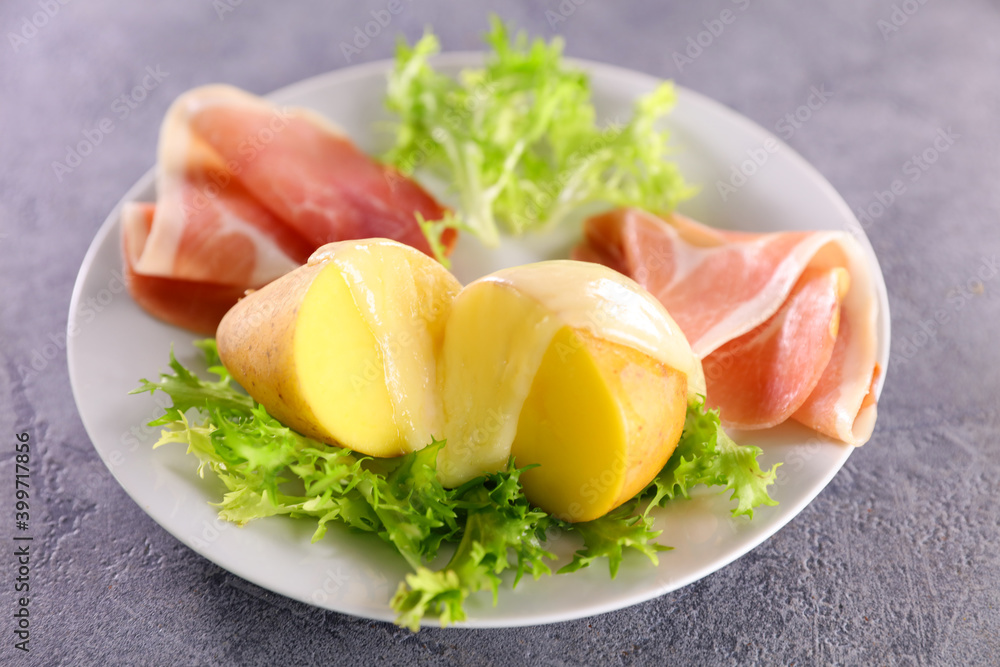 raclette cheese,  ham and potato