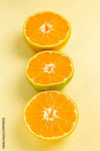 front view fresh tangerine slices on white background photo citrus orange color fruit