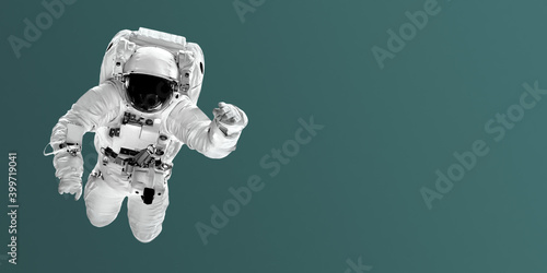 astronaut flies over color trend backgrounds. Elements of this image furnished by NASA
