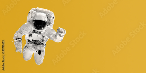 Fototapeta Naklejka Na Ścianę i Meble -  astronaut flies over color trend backgrounds. Elements of this image furnished by NASA