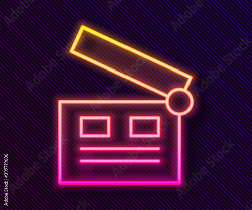 Glowing neon line Movie clapper icon isolated on black background. Film clapper board. Clapperboard sign. Cinema production or media industry. Vector Illustration.