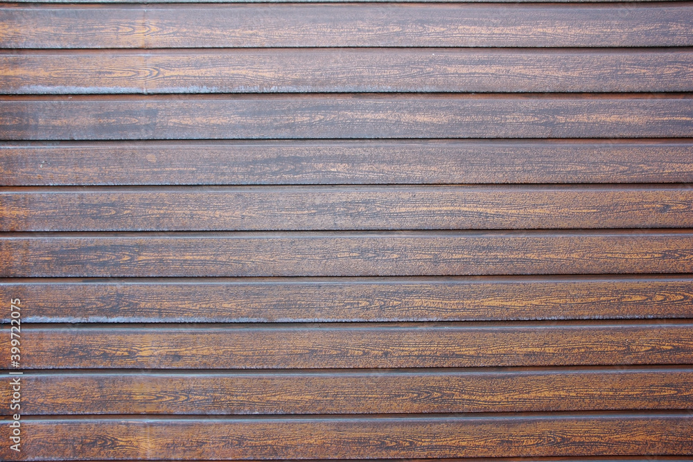 Obraz premium the texture of brown wooden planks with cracks