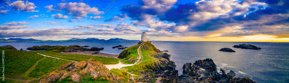Sunset panorama of Lighthouse on Llanddwyn Island at the coast of Anglesey in North Wales,UK