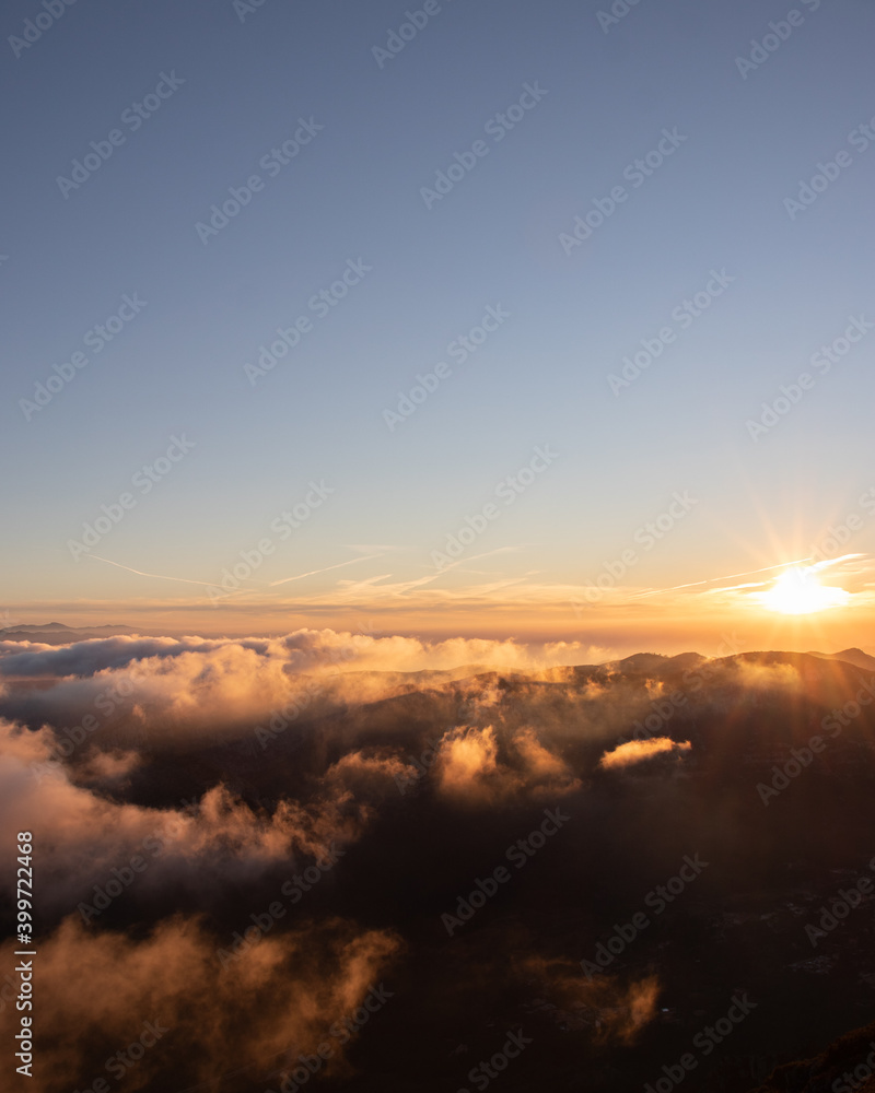 sunset over the clouds