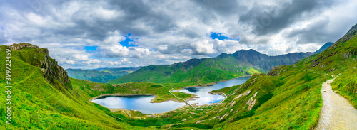Fotografie Panorama of beautiful landscape of Snowdonia National Park in North Wales overlo
