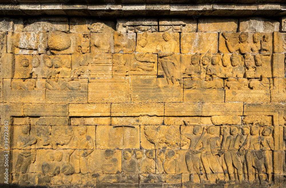 Bas-relief statue at Borobudur, a 9th-century Mahayana Buddhist temple in Central Java