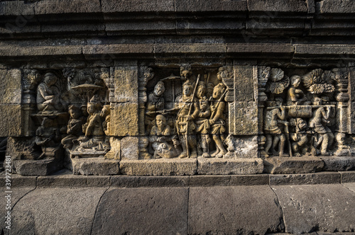 Bas-relief statue at Borobudur, a 9th-century Mahayana Buddhist temple in Central Java © gumbao