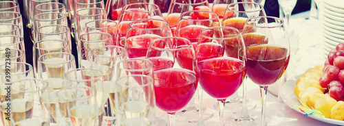 Photography glasses with white and red wine close-up before party in cafe