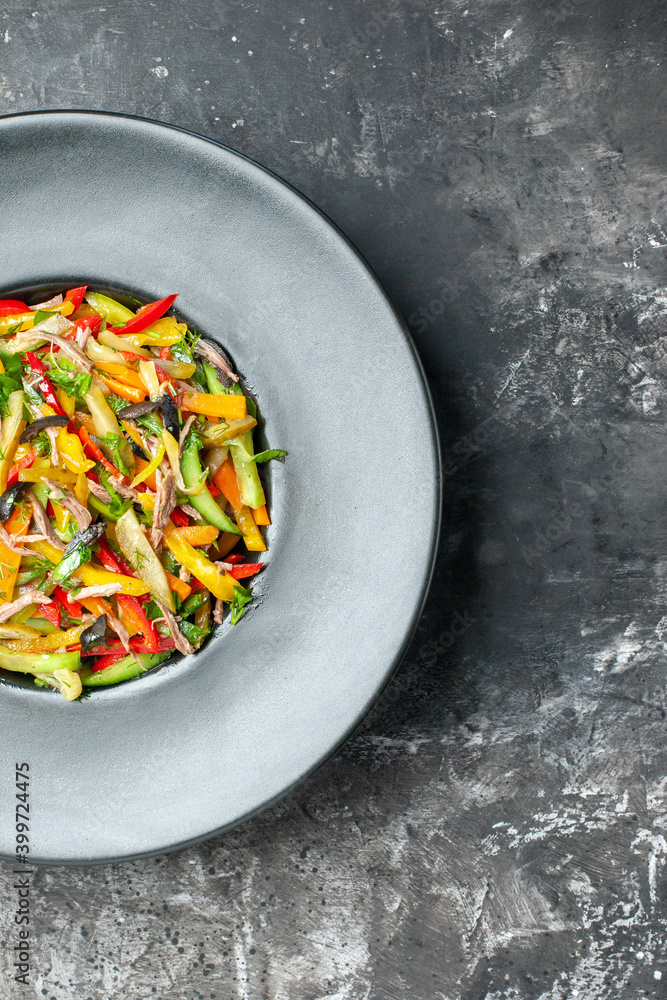 top view delicious vegetable salad inside plate on grey background color photo health food top view delicious vegetable salad inside plate on grey background color photo health food