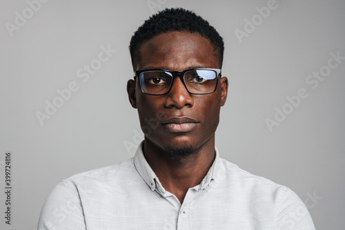 Closeup portrait of young african man thinking deeply © Drobot Dean