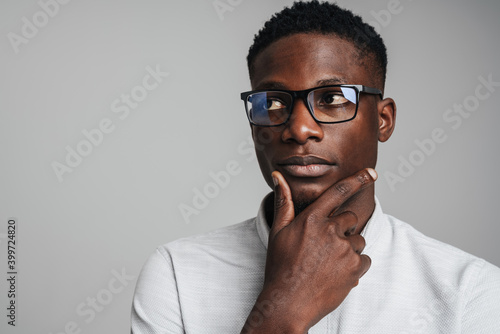 Closeup portrait of young african man thinking deeply