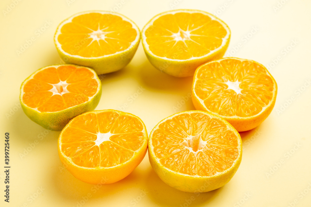 Fototapeta premium front view tangerine slices on white background fresh color orange citrus photo fruit