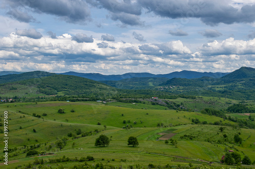 Mountain landscape against cloudy sky