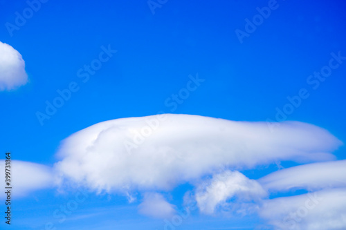 Soft focus of Cap Cloud with blue sky. Shot on the top of the mountain.