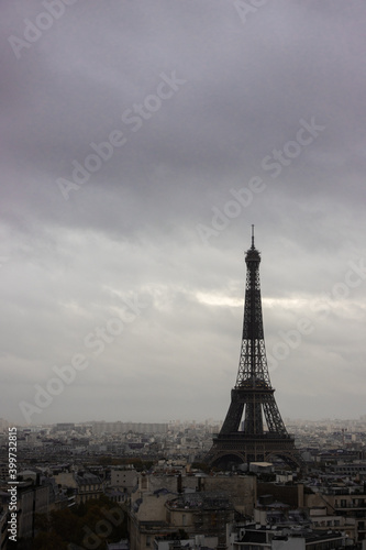 Eiffel tower with cloudy sky