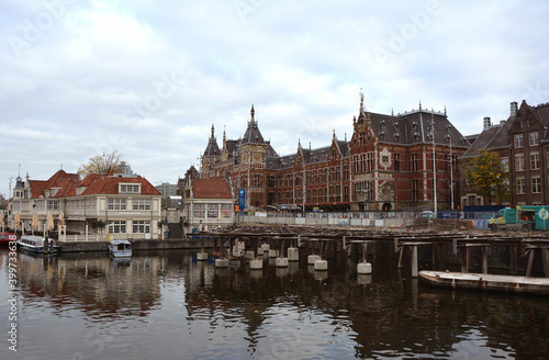 Amsterdam Netherland canal and houses on blue cloud sky