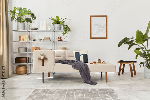 Canvastavla Cozy interior with stylish sofa, design coffee table, bookcase, plants, carpet, decoration, mock up poster map and elegant personal accessories