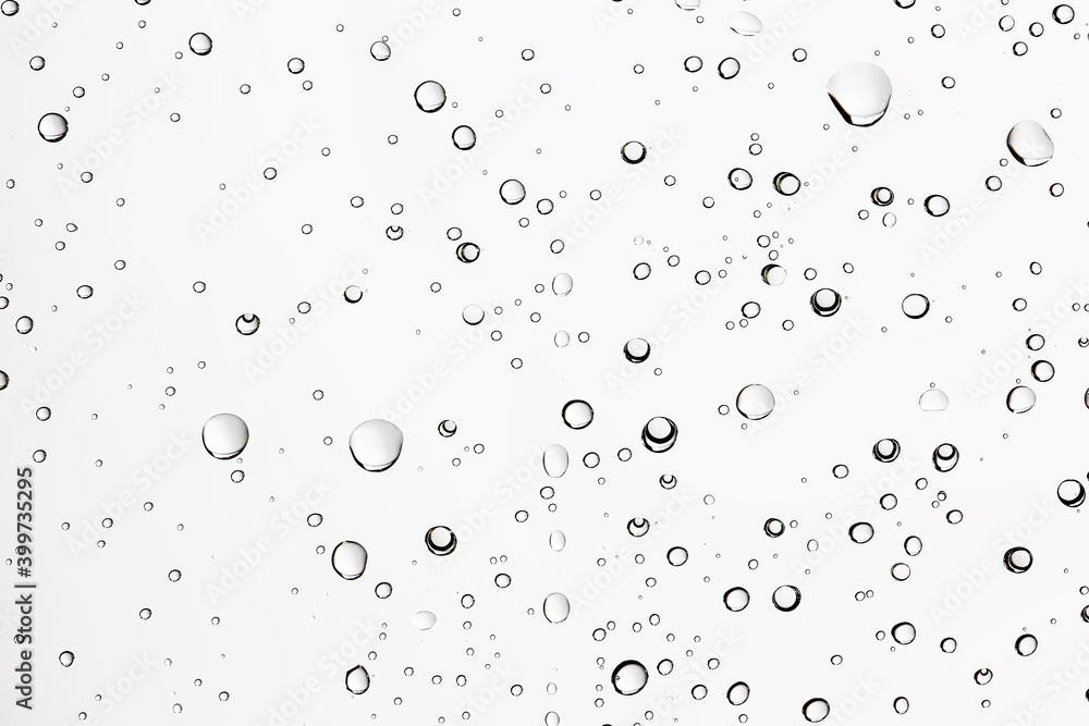 white isolated background water drops on the glass / wet window glass with splashes and drops of water and lime, texture autumn background white isolated background water drops on the glass / wet window glass with splashes and drops of water and lime, texture autumn background