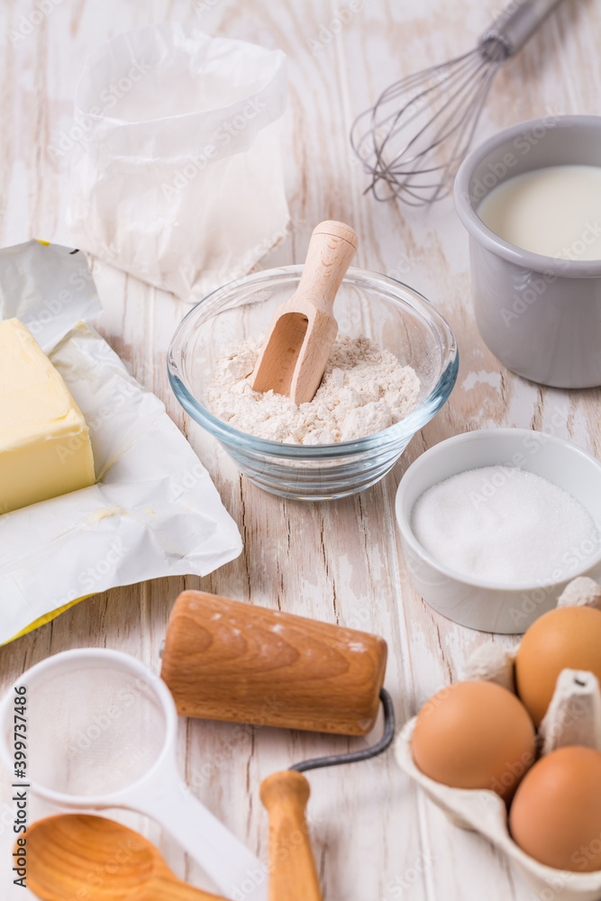 Assorted baking ingredients and kitchen utensils for cooking and baking Assorted baking ingredients and kitchen utensils for cooking and baking