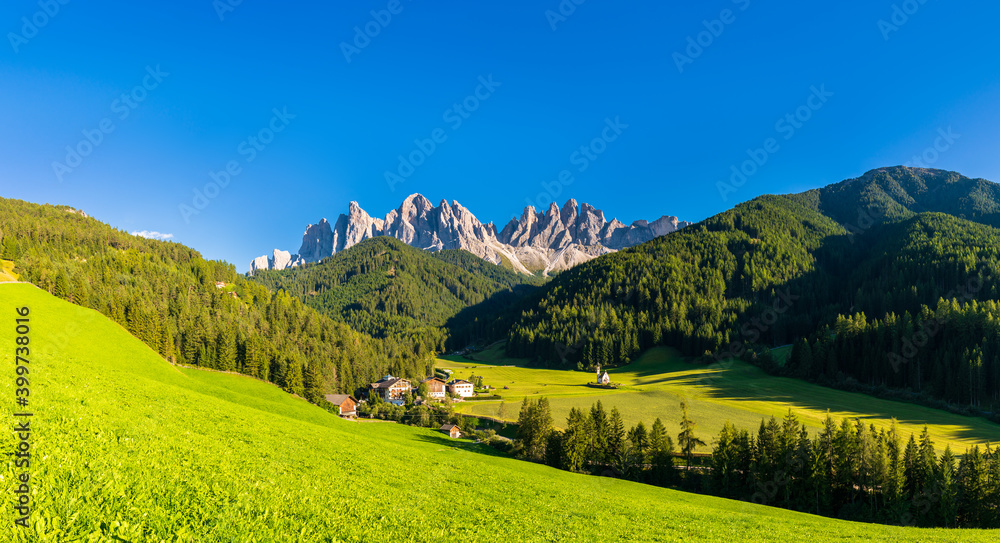 Scenic panorama of Santa Maddalena village and Geisler (Odle) Dolomites Mountain Peaks - Val Di Funes in South Tyrol, Italy