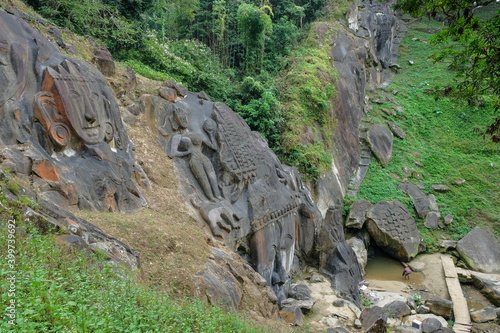 Sculptures carved into the rock at the archaeological site of Unakoti in the state of Tripura. India. photo