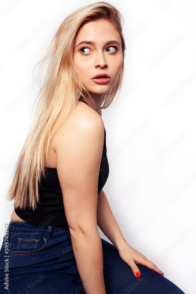 Fototapeta premium young blond woman on white backgroung gesture thumbs up, isolated emotional posing