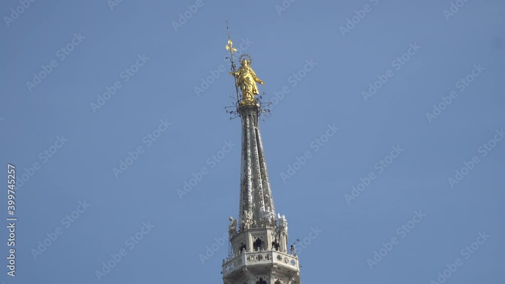 View from the roof of the Duomo Cathedral in Milan. Elements of sculptures and stone figures as decorations of the famous Italian church. View from the roof of the Duomo Cathedral in Milan. Elements of sculptures and stone figures as decorations of the famous Italian church.