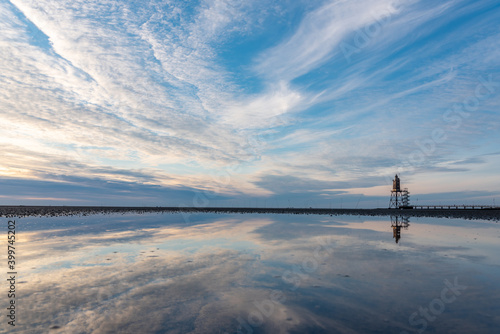 Fényképezés Wadden Sea with Lighthouse Obereversand in Dorum-Neufeld