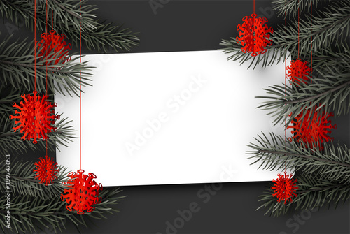 Fir branches with hanging red covid toys.